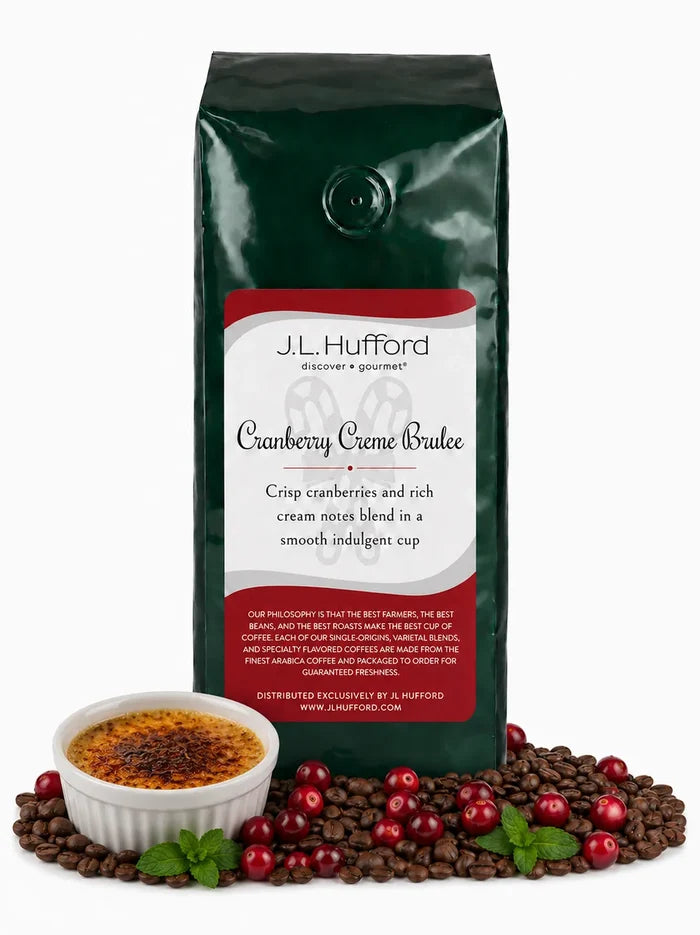 1 lb Cranberry Creme Brulee coffee beans bag with coffee beans, cranberries, and creme brulee in front displayed on a white background