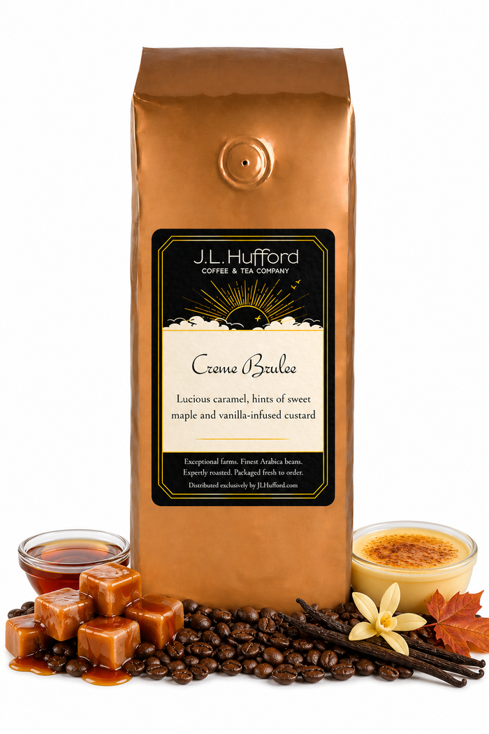 1 lb Creme Brulee coffee beans bag with coffee beans, blocks of caramel, maple syrup, vanilla sticks, and custard in front displayed on a white background