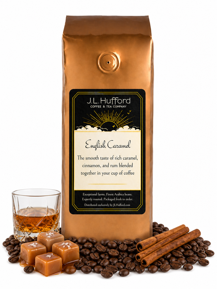 1 lb English Caramel coffee beans bag with coffee beans, cinnamon sticks, blocks of caramel, and a glass of rum in front displayed on a white background