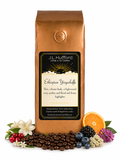 1 lb J.L. Hufford Ethiopian Yirgacheffe coffee bag with coffee beans, florals, and fruits on a white background