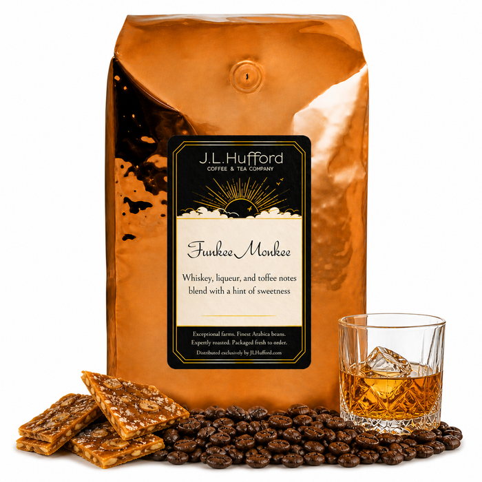5 lb Funkee Monkee coffee beans bag with coffee beans, toffee bark, and a glass of whiskey in front displayed on a white background