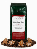 1 lb Gingerbread Spice coffee beans bag with coffee beans and gingerbread cookies in front displayed on a white background