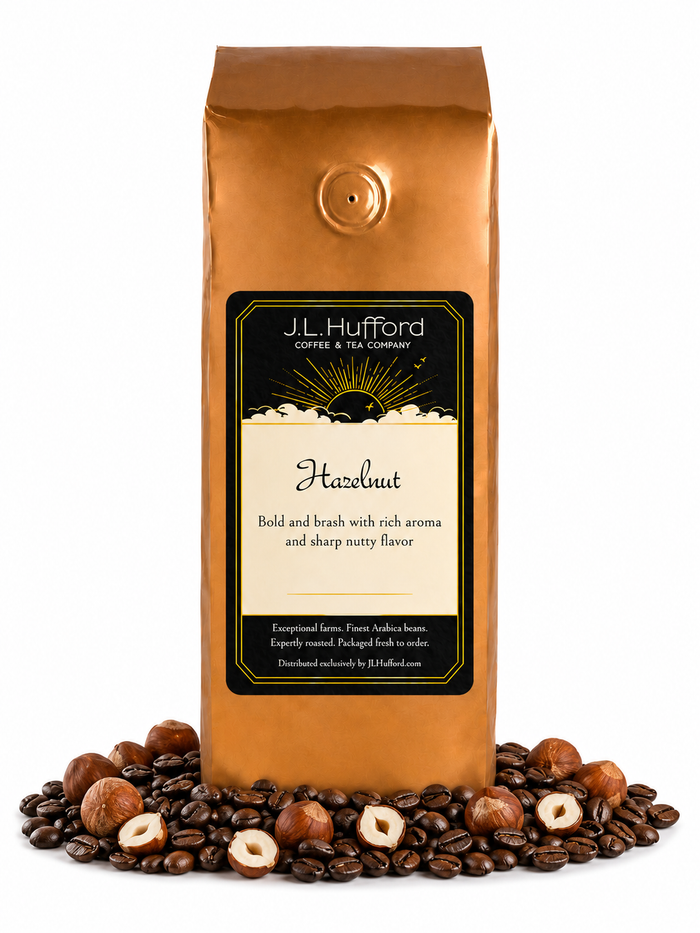 1 lb J.L. Hufford Hazelnut coffee bag with coffee beans and hazelnuts on a white background