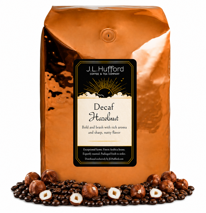 5 lb J.L. Hufford Decaf Hazelnut coffee bag with coffee beans and hazelnuts on a white background