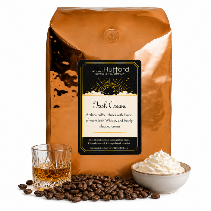 5 lb J.L. Hufford Irish Cream coffee bag with coffee beans, glass of Irish whiskey, and bowl of whipped cream on a white background