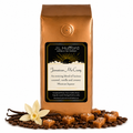 1 lb J.L. Hufford Jamaican Me Crazy coffee bag with coffee beans, blocks of caramel, and vanilla sticks on a white background