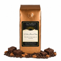 1 lb J.L. Hufford J Mocha Almond Fudge coffee bag with coffee beans, almonds, and fudge brownies on a white background