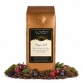 1 lb J.L. Hufford Kenya AA coffee bag with coffee beans, fruits, chocolate, and earth materials on a white background