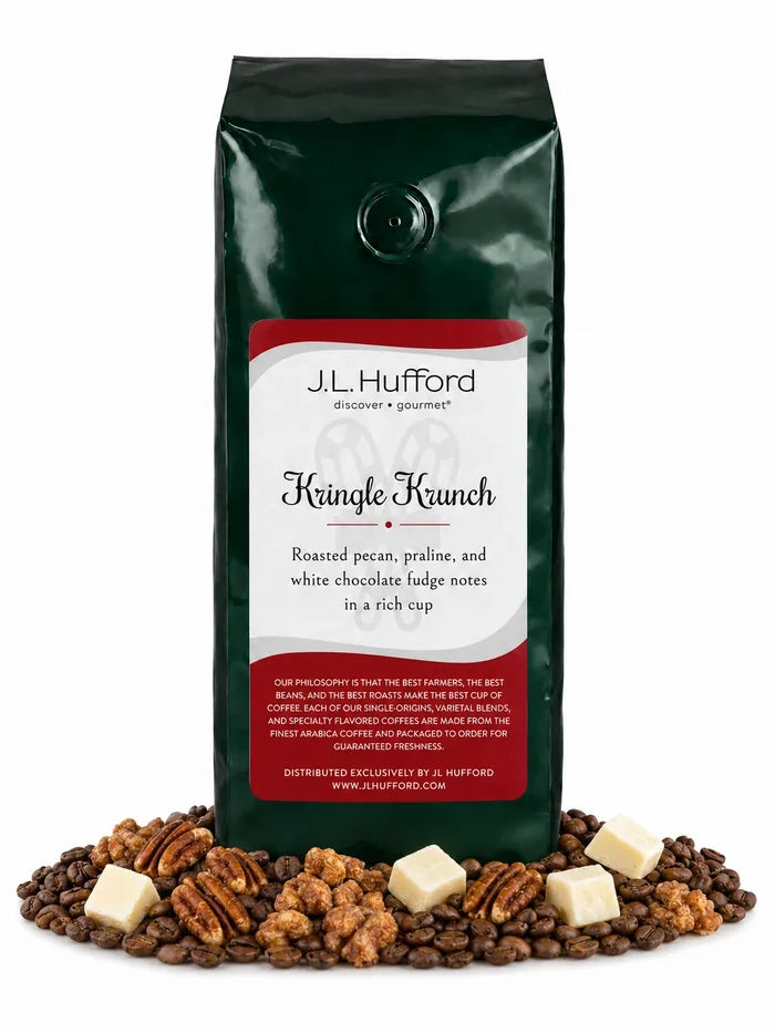 1 lb Kringle Krunch coffee beans bag with coffee beans, pecan, praline, and white chocolate fudge in front displayed on a white background