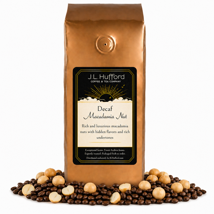 1 lb J.L. Hufford Decaf Macadamia Nut Coffee with coffee beans and macadamia nut in front displayed on a white background