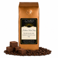 1 lb J.L. Hufford Mackinac Island Fudge coffee bag with coffee beans and fudge blocks on a white background