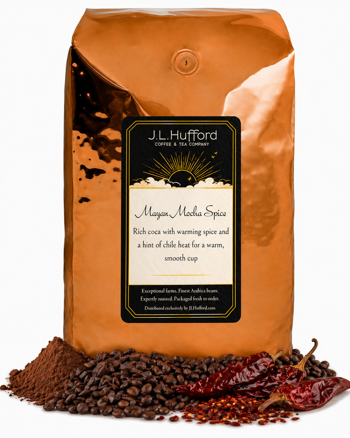 5 lb Mayan Mocha coffee beans bag with coffee beans, coca, chili in front displayed on a white background