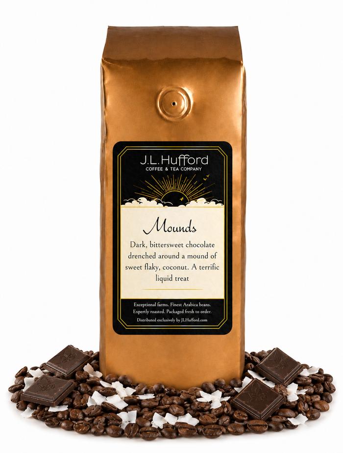 1 lb J.L. Hufford Mounds coffee bag with coffee beans, blocks of chocolate, and flakes of coconut on a white background