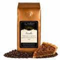 1 lb J.L. Hufford Pecanilla coffee bag with coffee beans and a slice of buttery pecan pie on a white background
