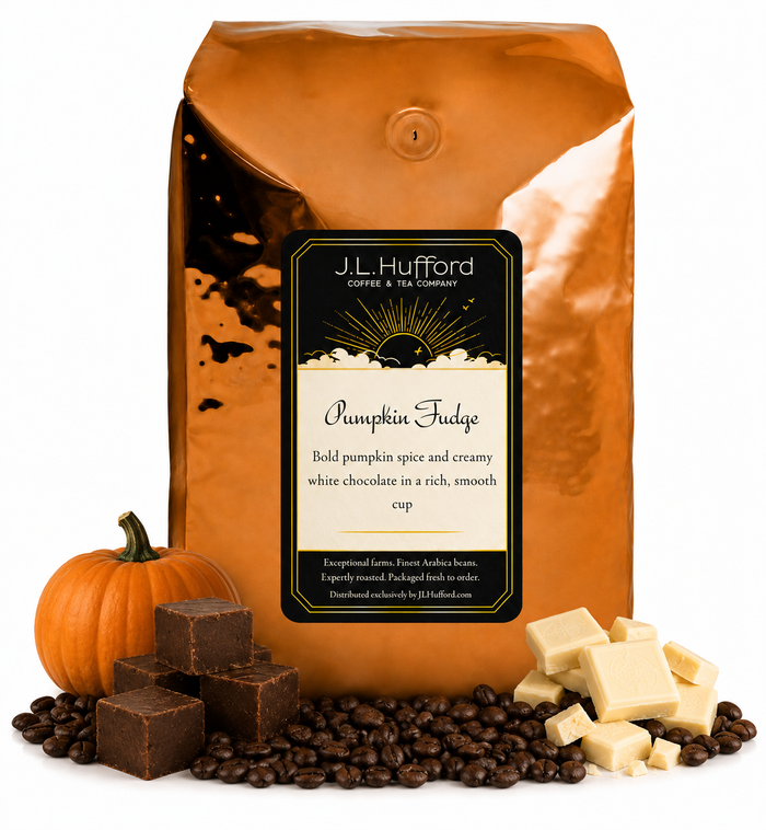 5 lb J.L. Hufford Pumpkin Fudge coffee bag with coffee beans, pumpkin, blocks of fudge, and blocks of white chocolate on a white background