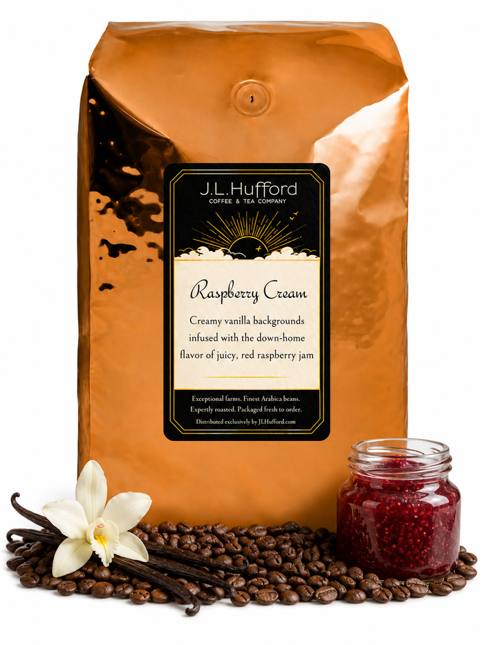 5 lb J.L. Hufford Raspberry Cream coffee bag with coffee beans, vanilla sticks, and a jar of raspberry jam on a white background