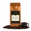 1 lb J.L. Hufford Rise and Shine coffee bag with coffee beans and mug of coffee on a white background