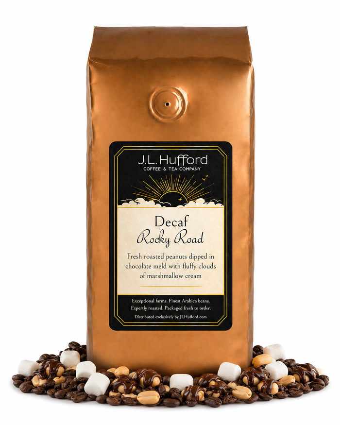 1 lb J.L. Hufford Decaf Rocky Road coffee bag with coffee beans, marshmallows, and peanuts covered in melted chocolate on a white background