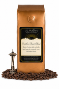 1 lb J.L. Hufford Seattle's Finest Blend coffee bag with coffee beans and space needle on a white background