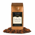 1 lb J.L. Hufford Southern Pecan coffee bag with coffee beans and pecans on a white background
