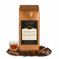 1 lb J.L. Hufford Spiced Butter Rum coffee bag with coffee beans, spices, and glass of rum on a white background