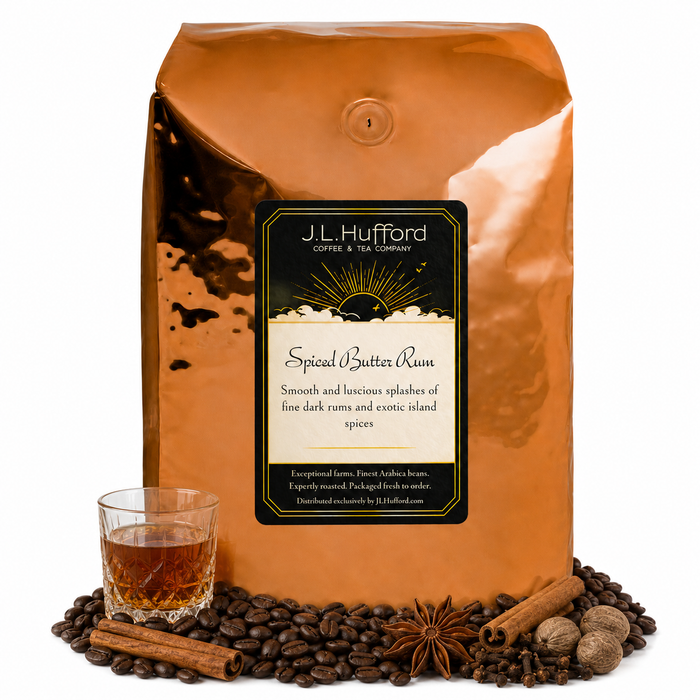 5 lb J.L. Hufford Spiced Butter Rum coffee bag with coffee beans, spices, and glass of rum on a white background