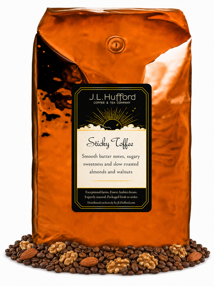 5 lb J.L. Hufford Sticky Toffee Coffee with coffee beans and roasted almonds and walnuts in front displayed on a white background