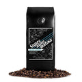 1 lb J.L. Hufford Superautomatika Blend Coffee bag with coffee beans in front displayed on a white background