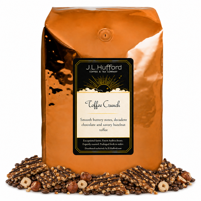 5 lb J.L. Hufford Toffee Crunch coffee bag with coffee beans, hazelnuts, and toffee bark with drizzled chocolate on a white background