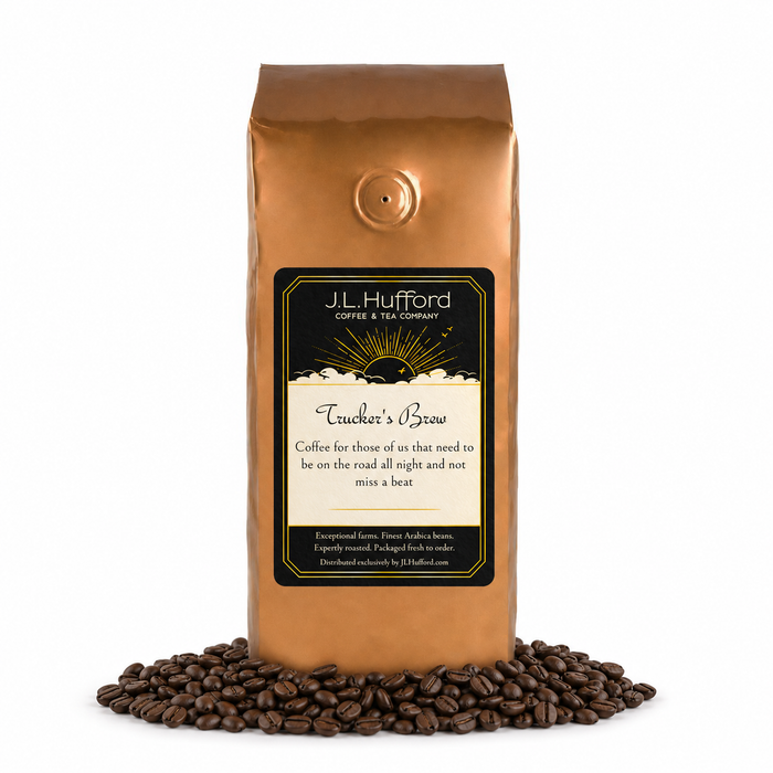 1 lb J.L. Hufford Trucker's Brew coffee bag with coffee beans on a white background