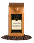 1 lb J.L. Hufford University Blend coffee bag with coffee beans on a white background