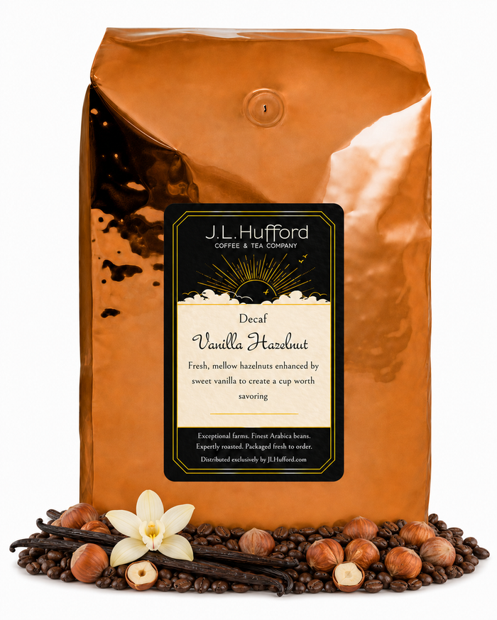 5 lb J.L. Hufford Decaf Vanilla Hazelnut coffee bag with coffee beans, vanilla sticks, and hazelnuts on a white background