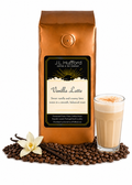 1 lb J.L. Hufford Vanilla Latte coffee bag with coffee beans, vanilla sticks, and a glass of vanilla latte on a white background
