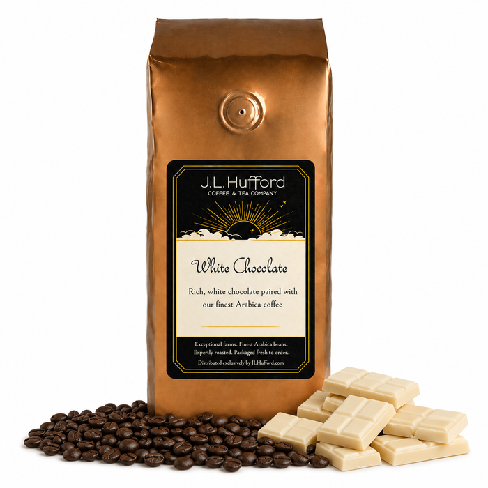 1 lb J.L. Hufford White Chocolate coffee bag with coffee beans and white chocolate bars on a white background