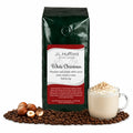 1 lb J.L. Hufford White Christmas coffee bag with coffee beans, hazelnuts, and white cocoa drink on a white background