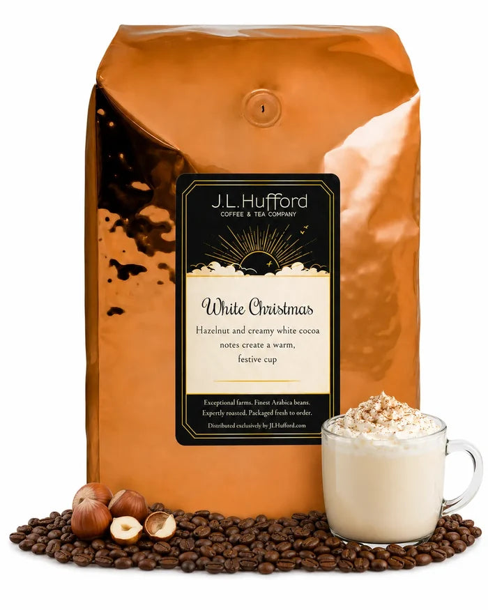 5 lb J.L. Hufford White Christmas coffee bag with coffee beans, hazelnuts, and white cocoa drink on a white background