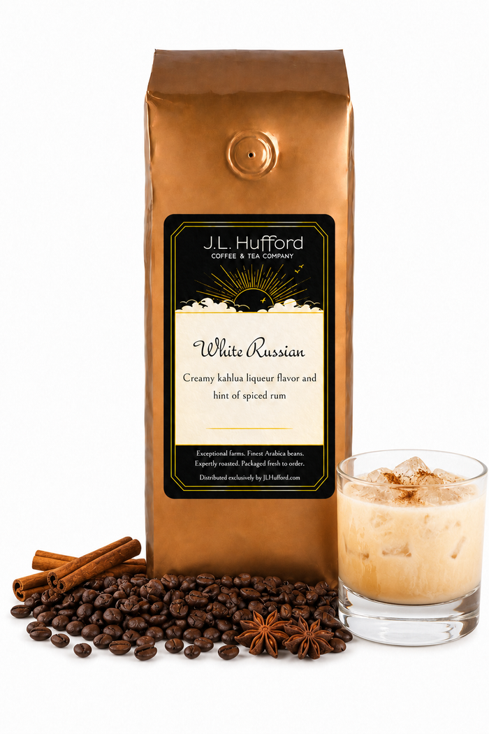 1 lb J.L. Hufford White Russian coffee bag with coffee beans, spices, and white Russian in a glass on a white background