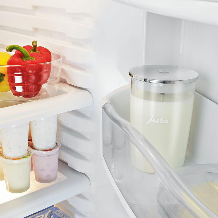 .5 liter Jura Glass Milk Container filled with milk placed inside a fridge door