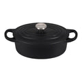 Licorice Le Creuset 1 qt Enameled Cast Iron Signature Oval Dutch Oven, Sand Interior with lid displayed on a white background