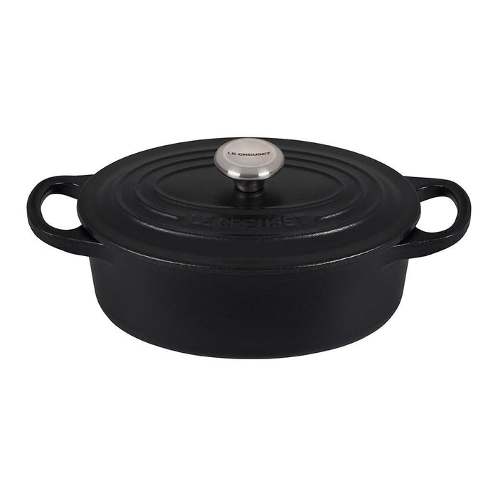 Licorice Le Creuset 1 qt Enameled Cast Iron Signature Oval Dutch Oven, Sand Interior with lid displayed on a white background