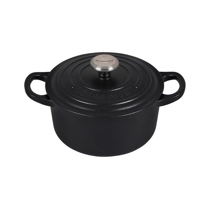 Licorice Le Creuset 1 qt Enameled Cast Iron Signature Round Dutch Oven with lid displayed on a white background