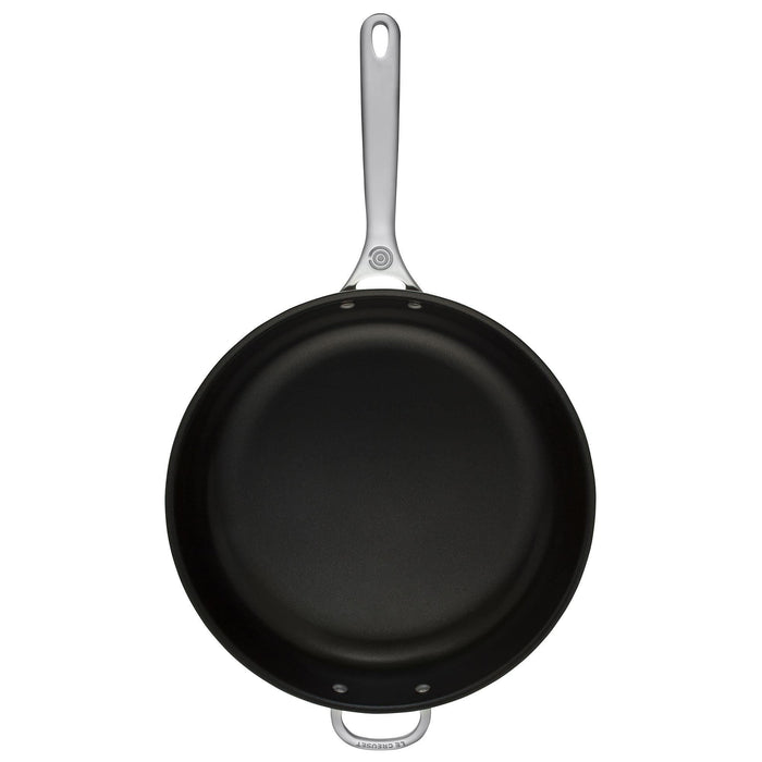 Top view of Le Creuset 12.5" Nonstick Deep Fry Pan with Helper Handle displayed vertically on a white background