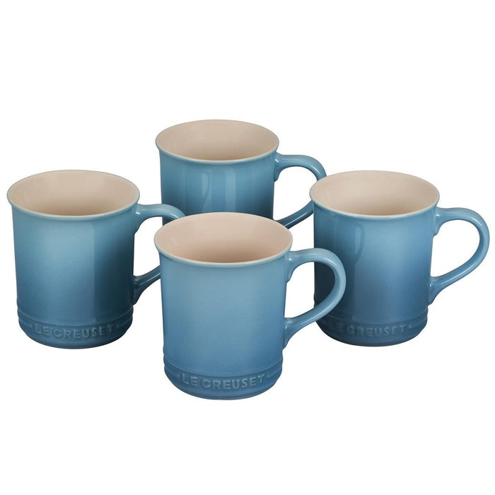 Set of 4 Caribbean Le Creuset mugs displayed on a white background