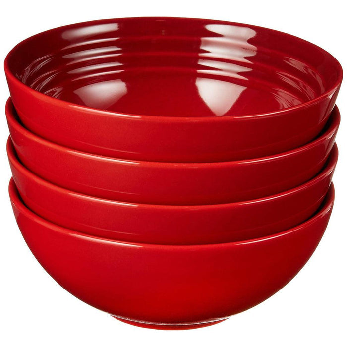 Set of 4 Cerise Le Creuset bowls displayed on a white background
