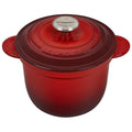 Cerise Le Creuset 2.25 qt Rice Pot with Stoneware Insert displayed on a white background