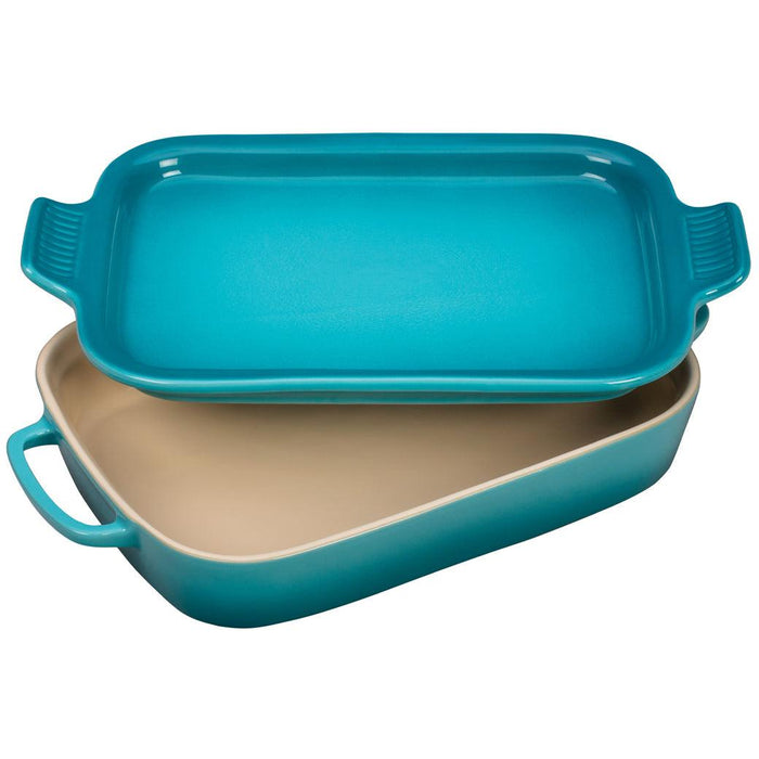 Caribbean Le Creuset 2.75 Qt Rectangular Dish with Platter Lid slanted displayed on a white background