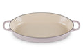 Shallot Le Creuset 3 qt enameled cast iron signature oval baker sand interior dutch oven with handles on a white background