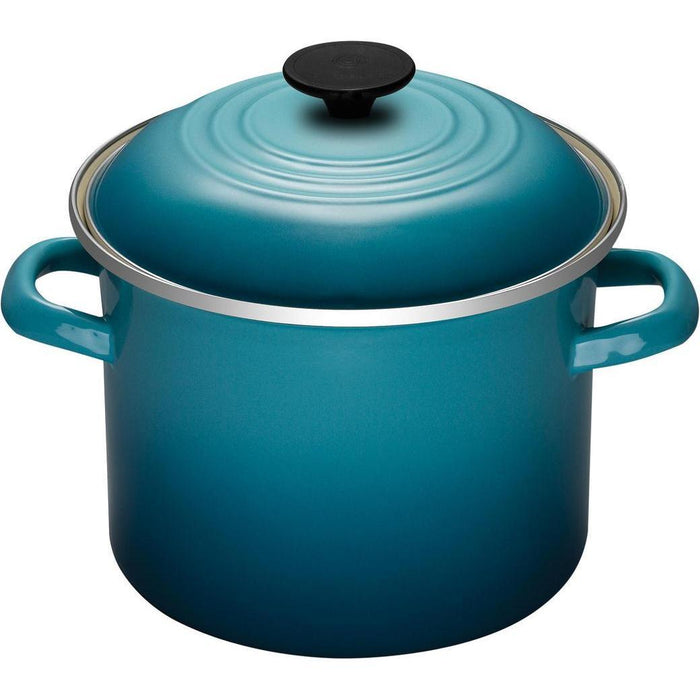 Caribbean Le Creuset 6 Qt stockpot from the side view on a white background