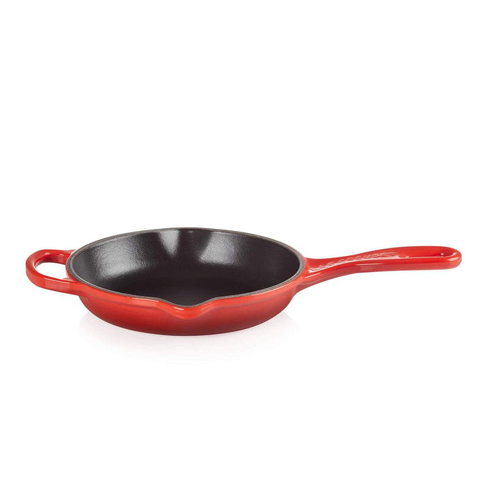 Cerise 6.33" Le Creuset skillet from the top angled view on a white background