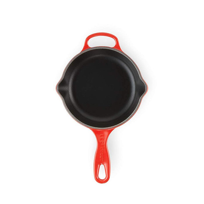 Cerise 6.33" Le Creuset skillet on the vertical plane top view on a white background